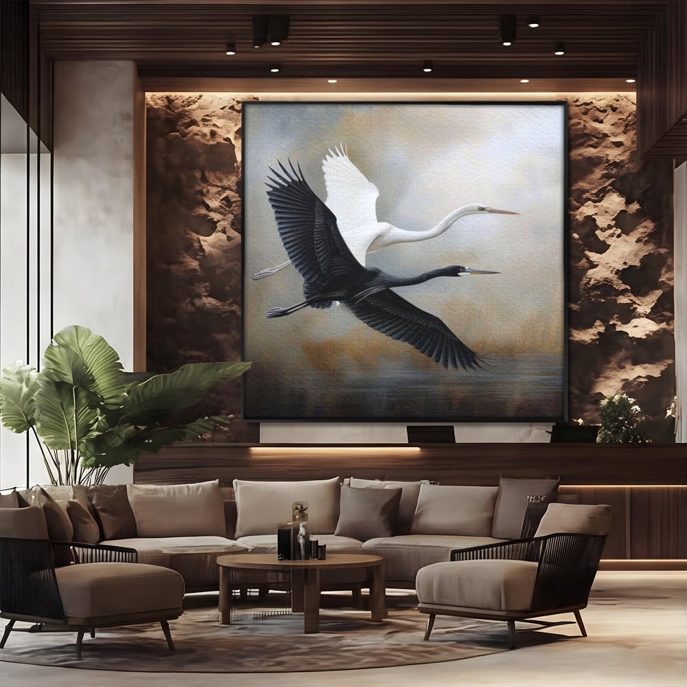 Tablou canvas cu tablou canvas cu doua pasari in zbor, in rama de aluminiu negru, pe perete intr-un birou